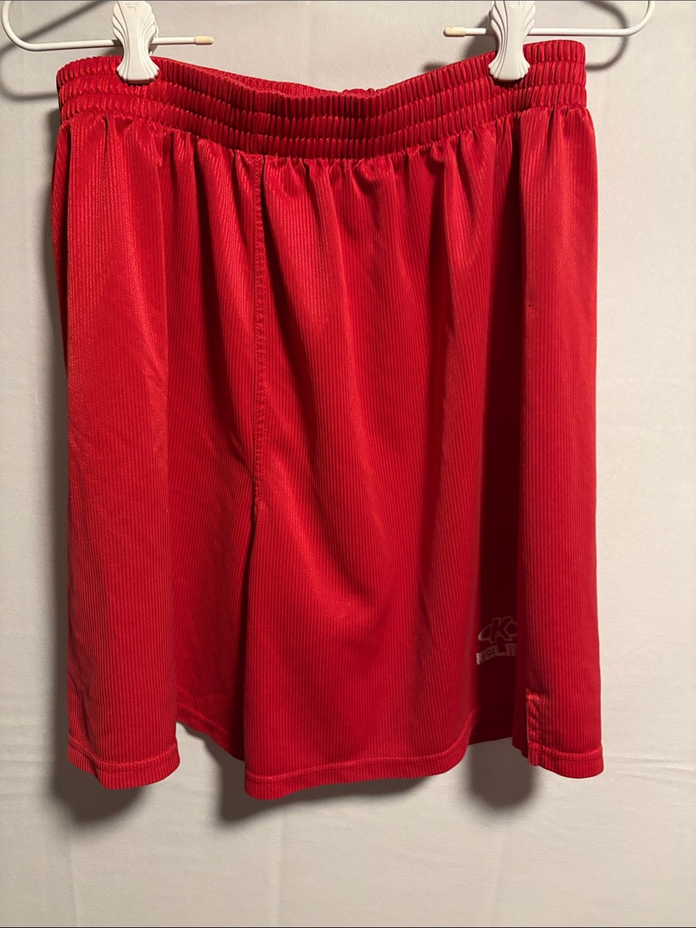 Kelme Red Athletic Shorts with White Logo